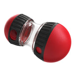 Side view of red and black interactive dog treat dispenser